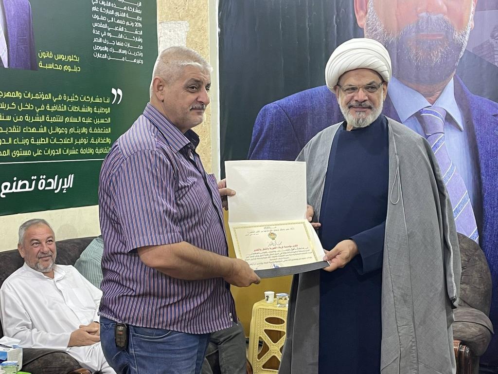 تكريم موكب جامعة أهل البيت(ع) لجهوده في العاشر من محرم والأربعين